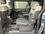 Volkswagen Multivan 1.4 eHybrid Energetic 7p. PANO/LEER+MASSAGE/ADAPTIVE-ONDERSTEL/H&K/HEAD-UP/KEYLESS/EL.SCHUIFDEUREN/SFEER/ACC/CAMERA/PRIVACY/EL.A.KLEP/INDIUMGRAU METALLIC/VOLLEDIG VW DEALER HISTORIE