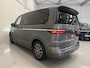 Volkswagen Multivan 1.4 eHybrid Energetic 7p. PANO/LEER+MASSAGE/ADAPTIVE-ONDERSTEL/H&K/HEAD-UP/KEYLESS/EL.SCHUIFDEUREN/SFEER/ACC/CAMERA/PRIVACY/EL.A.KLEP/INDIUMGRAU METALLIC/VOLLEDIG VW DEALER HISTORIE