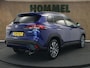 Toyota Corolla Cross 2.0 High Power Hybrid First Edition - CAMERA - LENDENSTEUN BESTUURDERSSTOEL - 18 INCH LICHT METALEN VELGEN - PANORAMADAK - 4 SEIZOENENBANDEN - PARKEERSENSOREN VOOR/ ACHTER - NAVIGATIE - CLIMATE CONTROL - VOORSTOELEN VERWARMD - STUUR VERWARMD - ELEKTRISCHE ACHTERKLEP