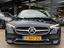 Mercedes-Benz C-klasse 300 e Luxury Line WEG KLAPBARE TREKHAAK | SFEER VERLICHTING | 360 GRADEN CAMERA |  ELEKTRISCH VERSTELBARE STOELEN | STOELVERWARMING | STUURVERWARMING | STOELKOELING | PANORAMADAK | NAVIGATIE | LED | DODEHOEK DETECTIE | APPLE CARPLAY / ANDROID AUTO | ADAPTIEVE CRUISECONTROL |