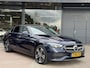 Mercedes-Benz C-klasse 300 e Luxury Line WEG KLAPBARE TREKHAAK | SFEER VERLICHTING | 360 GRADEN CAMERA |  ELEKTRISCH VERSTELBARE STOELEN | STOELVERWARMING | STUURVERWARMING | STOELKOELING | PANORAMADAK | NAVIGATIE | LED | DODEHOEK DETECTIE | APPLE CARPLAY / ANDROID AUTO | ADAPTIEVE CRUISECONTROL |