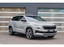 Skoda Karoq 1.5 TSI 150pk DSG ACT Sportline Business | Panoramadak | Trekhaak | All Seasonbanden  | Stoelverwarming | Rondomzicht Camera | Keyless