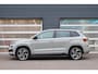 Skoda Karoq 1.5 TSI 150pk DSG ACT Sportline Business | Panoramadak | Trekhaak | All Seasonbanden  | Stoelverwarming | Rondomzicht Camera | Keyless