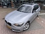BMW 1-Serie 118i Sport Line Airco Cruise Navi Open dak PDC