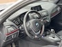 BMW 1-Serie 118i Sport Line Airco Cruise Navi Open dak PDC