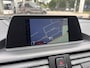 BMW 1-Serie 118i Sport Line Airco Cruise Navi Open dak PDC