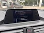 BMW 1-Serie 118i Sport Line Airco Cruise Navi Open dak PDC