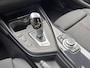 BMW 1-Serie 118i Sport Line Airco Cruise Navi Open dak PDC