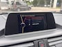 BMW 1-Serie 118i Sport Line Airco Cruise Navi Open dak PDC