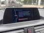 BMW 1-Serie 118i Sport Line Airco Cruise Navi Open dak PDC