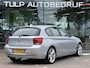 BMW 1-Serie 118i Sport Line Airco Cruise Navi Open dak PDC