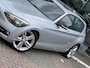 BMW 1-Serie 118i Sport Line Airco Cruise Navi Open dak PDC