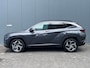 Hyundai Tucson 1.6 T-GDI 265pk PHEV Comfort Smart 4WD | Climate | Camera | Carplay | Keyless | Navigatie | Full - Led | Elek. Klep | Winterpakket | 19" Lichtmetaal | Digitale Cockpit | Parkeer Assistent | Adapt. Cruisecontrol | 1e Eigenaar