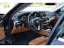 BMW 5-Serie 520i Luxury | Opendak | Head Up | Comfortstoelen | Adaptive Cruise | Stuur en stoelverw | Elektrische achterklep |