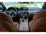 BMW 5-Serie 520i Luxury | Opendak | Head Up | Comfortstoelen | Adaptive Cruise | Stuur en stoelverw | Elektrische achterklep |