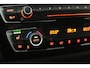 BMW 1-Serie 118i High Executive (CAMERA, STOELVERWARMING, NAVIGATIE, CRUISE CONTROL)