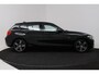 BMW 1-Serie 118i High Executive (CAMERA, STOELVERWARMING, NAVIGATIE, CRUISE CONTROL)