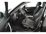 BMW 1-Serie 118i High Executive (CAMERA, STOELVERWARMING, NAVIGATIE, CRUISE CONTROL)