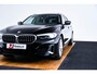 BMW 5-Serie Touring 520d xDrive High Executive Luxury Line - Trekhaak - Panoramadak - zonneschermen - Getinte ruiten - Parking Assistant - BMW Live Cockpit Professional - Elektrisch verwarmde voorstoelen -