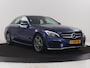 Mercedes-Benz C-klasse 200 Ambition AMG-line | Leder | Cruise control | Elektrische stoelen | Navigatie | Bluetooth | Park assist | Climate control | Full LED | 18" velgen