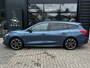 Ford Focus Wagon 1.0 125 PK ST Line | TREKHAAK| STOEL, STUUR EN VOORRUITVERWARMING| 18" LM-VELGEN| NAVIGATIE + APPLE CARPLAY/ANDROID AUTO| KEYLESS ENTRY & START| PARKEERSENSOREN ACHTER| DEALER ONDERHOUDEN|