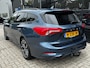 Ford Focus Wagon 1.0 125 PK ST Line | TREKHAAK| STOEL, STUUR EN VOORRUITVERWARMING| 18" LM-VELGEN| NAVIGATIE + APPLE CARPLAY/ANDROID AUTO| KEYLESS ENTRY & START| PARKEERSENSOREN ACHTER| DEALER ONDERHOUDEN|