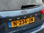 Ford Focus Wagon 1.0 125 PK ST Line | TREKHAAK| STOEL, STUUR EN VOORRUITVERWARMING| 18" LM-VELGEN| NAVIGATIE + APPLE CARPLAY/ANDROID AUTO| KEYLESS ENTRY & START| PARKEERSENSOREN ACHTER| DEALER ONDERHOUDEN|