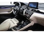 BMW X1 sDrive20i High Executive Edition | PANORAMADAK | HEAD UP | LEDER | HARMAN KARDON | DAB | TREKHAAK | 19"
