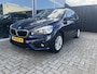 BMW 2-Serie Active Tourer 216i Centennial Executive Trekhaak / Clima / Navi / Cruise. Ketting recent vervongen.