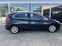 BMW 2-Serie Active Tourer 216i Centennial Executive Trekhaak / Clima / Navi / Cruise. Ketting recent vervongen.