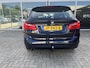 BMW 2-Serie Active Tourer 216i Centennial Executive Trekhaak / Clima / Navi / Cruise. Ketting recent vervongen.