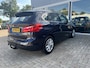 BMW 2-Serie Active Tourer 216i Centennial Executive Trekhaak / Clima / Navi / Cruise. Ketting recent vervongen.