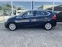 BMW 2-Serie Active Tourer 216i Centennial Executive Trekhaak / Clima / Navi / Cruise. Ketting recent vervongen.