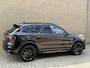 Lynk & Co 01 1.5 PHEV 261pk | Blackline | Zwarte hemel | Rolhoes | 360 camera | Panoramadak | 20 inch velgen | Adaptieve cruise | Navigatie | CarPlay | Keyless | LED | DAB | Infinity | Stoelverwarming | Elektrische achterklep | Volledig dealeronderhouden | Fabrieksgarantie
