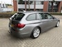 BMW 5-Serie Touring 528xi High Executive Panoramadak Trekhaak