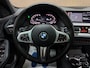 BMW 1-Serie 120i M-Pakket 2024 NAP PANO KUIPSTOELEN LED CAMERA