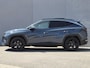 Hyundai Tucson 1.6 T-GDI PHEV Premium Sky 4WD / Glazen schuif- en kanteldak / Rondomzicht camera / Trekgewicht 1.350 kg / Elektrische achterklep / Stuur- Stoel & Achterbank verwarming / Adaptief cruise control / Stoelventilatie / Apple Carplay Android Auto /