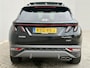 Hyundai Tucson 1.6 T-GDI PHEV Comfort Smart Sky 4WD / Dealer Onderhouden / SOH 100% / Panoramadak / Adaptief Cruise Control / Navigatie / Achteruitrijcamera / Apple Carplay & Android Auto / Stoel & Stuurverwarming / 19" LM Velgen / Elektrische Achterklep /