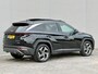 Hyundai Tucson 1.6 T-GDI PHEV Comfort Smart Sky 4WD / Dealer Onderhouden / SOH 100% / Panoramadak / Adaptief Cruise Control / Navigatie / Achteruitrijcamera / Apple Carplay & Android Auto / Stoel & Stuurverwarming / 19" LM Velgen / Elektrische Achterklep /