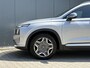 Hyundai Santa Fe 1.6 T-GDI PHEV Premium Sky 7p. SOH 100% / Elektrisch glazen panorama-dak / Automaat / All-season banden / Navigatie / Apple Carplay/Android Auto / Stoel verwarming/verkoeling / Airco separaat achter / Achter stoelverwarming / Cruise Control /
