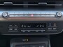 Hyundai Kona Electric Comfort Smart 65.4 kWh / Navigatie / Cruise Control Adaptief / Climate Control / Achterklep Elektrisch / Stoel & Stuurwiel Verwarming Voorzijde /