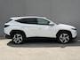 Hyundai Tucson 1.6 T-GDI PHEV Comfort Smart 4WD / Fabrieksgarantie tot 1-2028 / Volledig Onderhouden / Navigatie / Camera / PDC / DAB / Dodehoek Detectie / All Season Banden / Stoelverwarming /