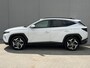 Hyundai Tucson 1.6 T-GDI PHEV Comfort Smart 4WD / Fabrieksgarantie tot 1-2028 / Volledig Onderhouden / Navigatie / Camera / PDC / DAB / Dodehoek Detectie / All Season Banden / Stoelverwarming /