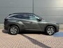 Hyundai Tucson 1.6 T-GDI HEV Comfort Smart / Afneembare Trekhaak / 1650 kg Trekgewicht / Stoel en Stuurverwarming / Navigatiesysteem / Apple Carplay / Android Auto / Adaptieve Cruise Control / Achteruitrijcamera / fabrieksgarantie tot mei 2027