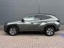 Hyundai Tucson 1.6 T-GDI HEV Comfort Smart / Afneembare Trekhaak / 1650 kg Trekgewicht / Stoel en Stuurverwarming / Navigatiesysteem / Apple Carplay / Android Auto / Adaptieve Cruise Control / Achteruitrijcamera / fabrieksgarantie tot mei 2027