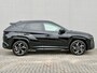 Hyundai Tucson 1.6 T-GDI PHEV N Line Sky 4WD / Facelift / Fabrieksgarantie tot 12-2029 / Dealer onderhouden / Panorama schuifdak / Navigatie / Camera / Elektrische Achterklep / Stuur & Stoelverwarming / Apple Carplay Android / 19" LM wielen /