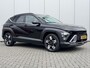 Hyundai Kona 1.6 GDI HEV Comfort Smart / Fabrieksgarantie tot 2-2030 / Stoel- & Stuurverwarming / Navigatie / Achteruitrijcamera / Adaptive Cruise Control / Climate Control / LED Verlichting /