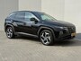 Hyundai Tucson 1.6 T-GDI PHEV Comfort Smart 4WD / Fabrieksgarantie tot 05-2027 / Dealer onderhouden / Navigatie / Camera / Apple Carplay/Android Auto / Stuur- en stoelverwarming / 19" LM wielen /