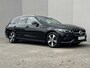Mercedes-Benz C-klasse Estate 300 e Luxury Line / Dealer onderhouden / 1.800 kg elektrische trekhaak / Elektrische stoelen & Achterklep / Navi / Apple Carplay Android / 17" LM wielen /