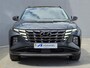 Hyundai Tucson 1.6 T-GDI PHEV Comfort Smart 4WD / Fabrieksgarantie tot 02-2029 / Dealer onderhouden / Glazen schuif- en kanteldak / Stuur- & Stoelverwarming / Trekgewicht 1350 kg / Achteruitrijcamera / Apple Carplay Android Auto / Adaptief cruise control /